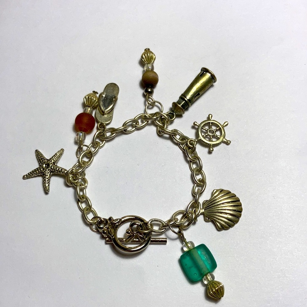 Silver-tone beach themed bracelet.
